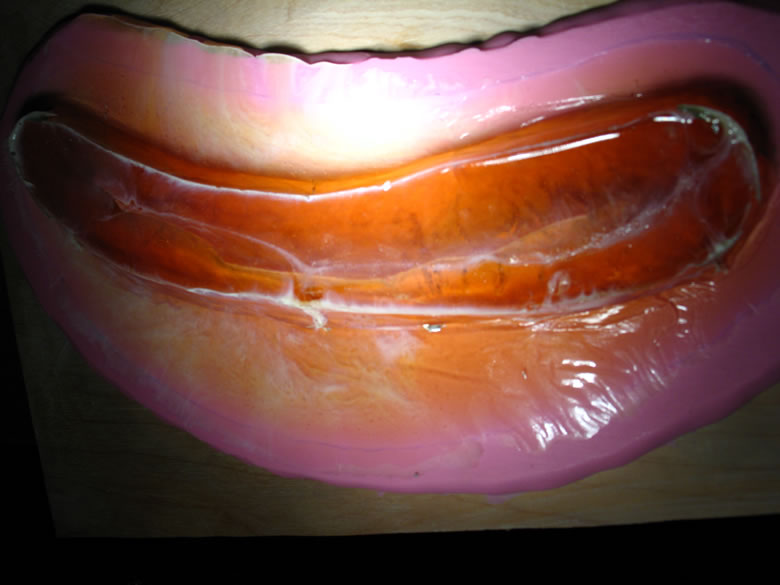 Cast released from top half of mold